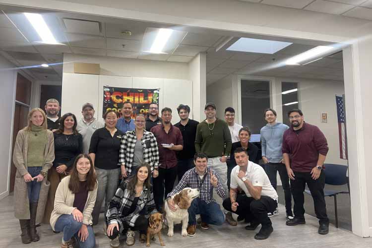 Team picture with dogs